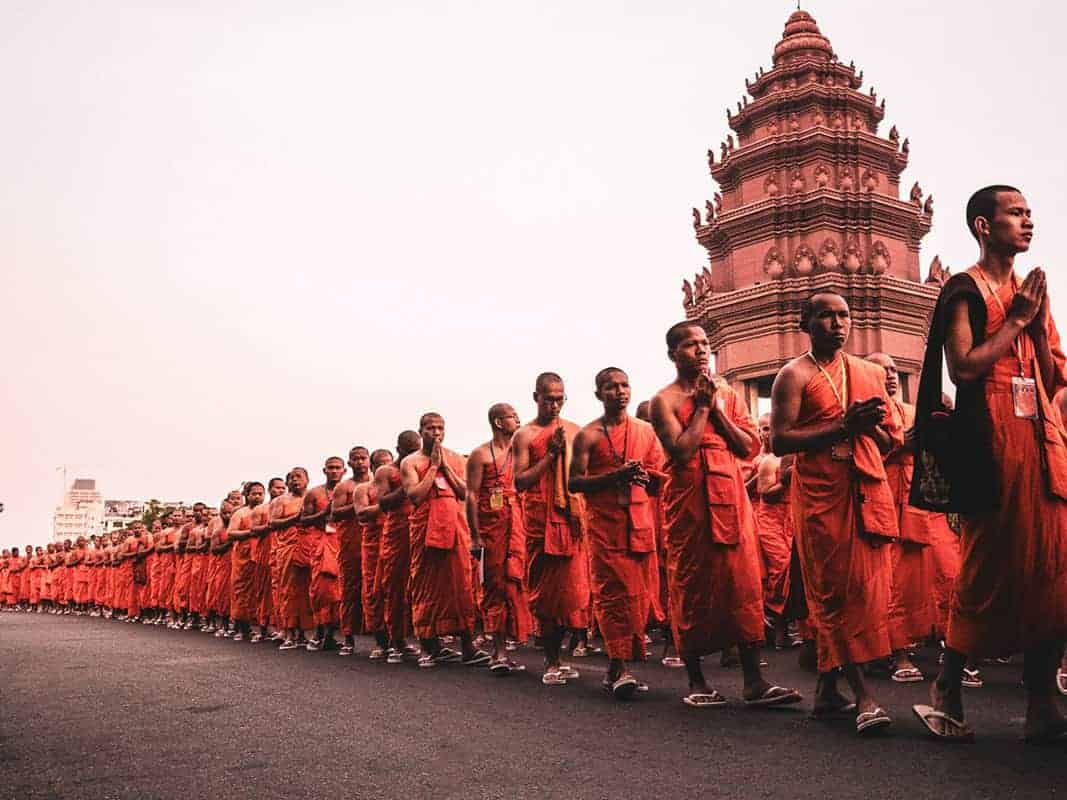 Monks walking in procession at Angkor Wat, Cambodia.